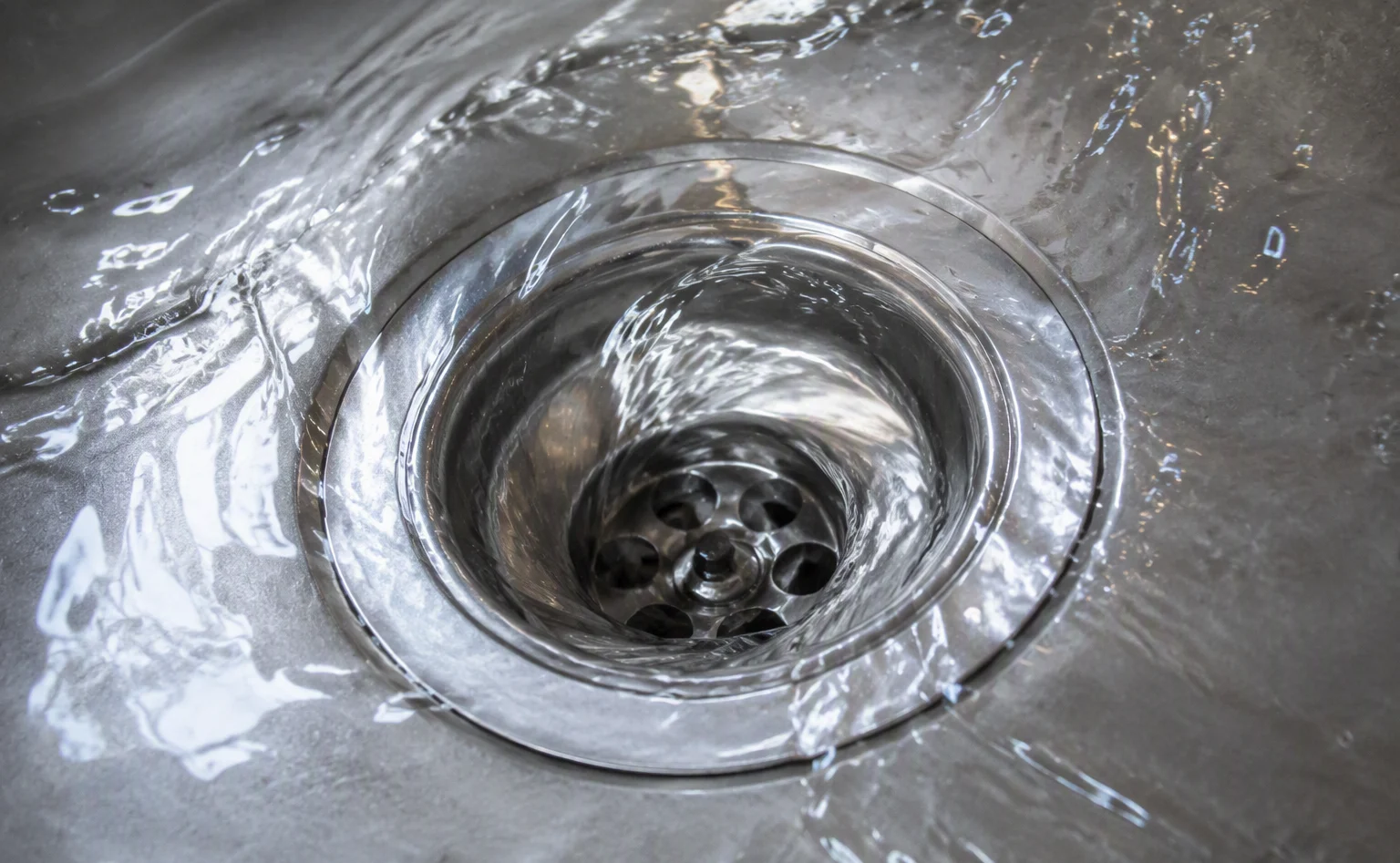 Drain cleaning and clog removal in a Ames home